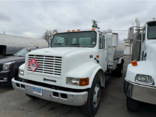 Tudor Energy delivery truck parked roadside